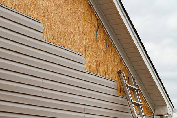 Professional Emergency Siding Repair technician working in Morrow, GA